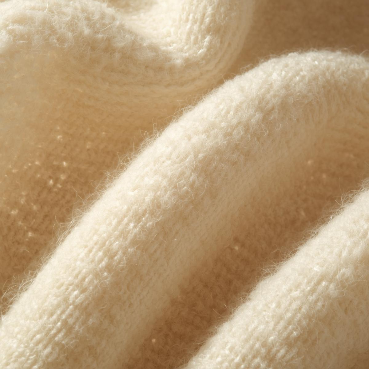 close up wool boucle fabric texture, soft cream wool cloth with looped yarn texture, rich dimensional textile surface, natural sunlight highlighting fibers, editorial textile photography