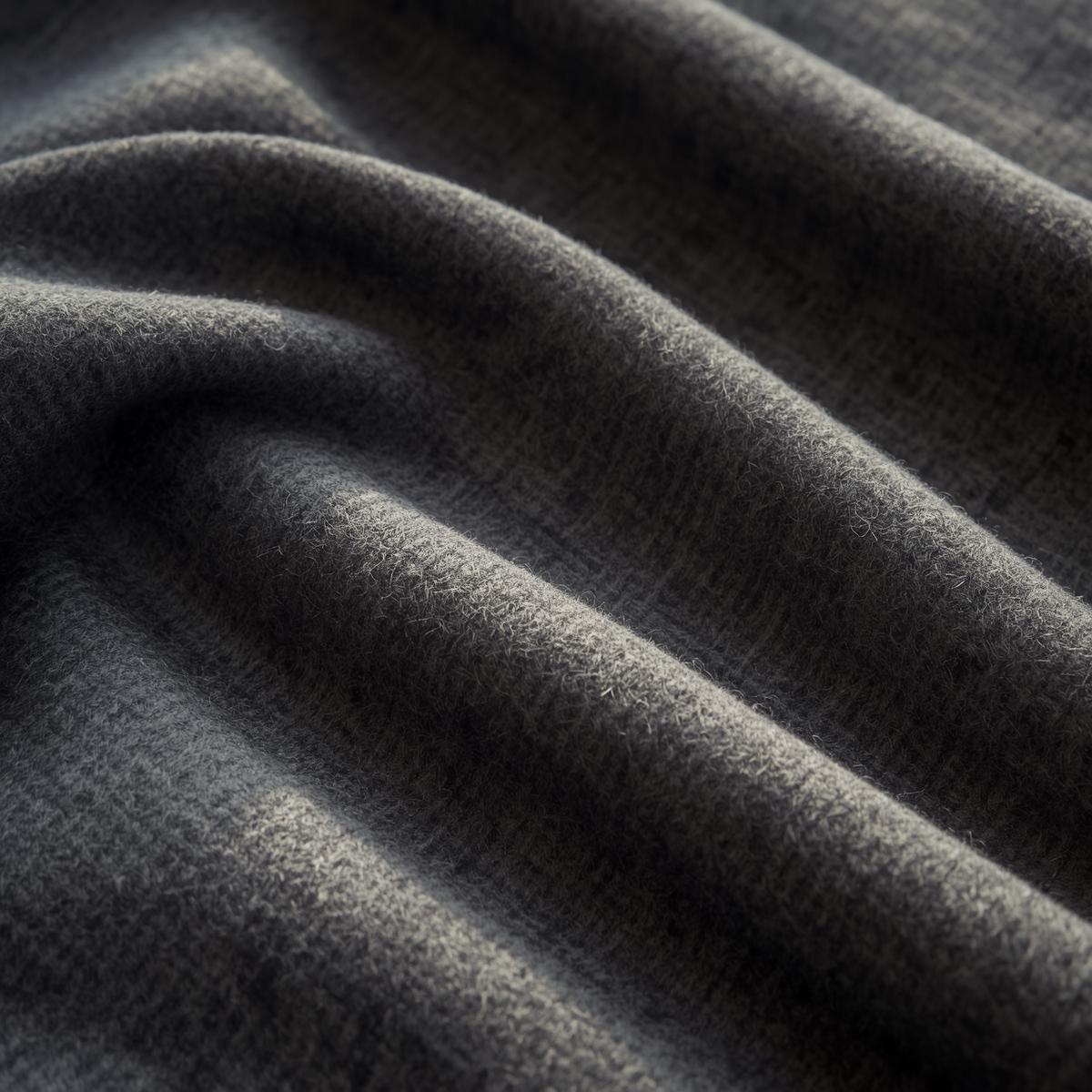 folded wool flannel fabric, charcoal gray brushed wool cloth with soft matte texture, smooth warm textile surface, natural sunlight, cozy editorial textile photography